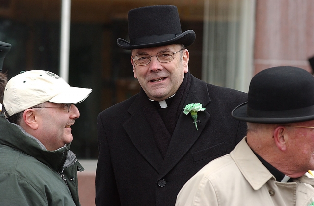 Between Bishop Henry J. Mansell and Bishop Edward U. Kmiec, Bishop-Elect, Msgr. Robert Cunningham participated in the 2004 St. Patrick's Day Parade in Buffalo. 